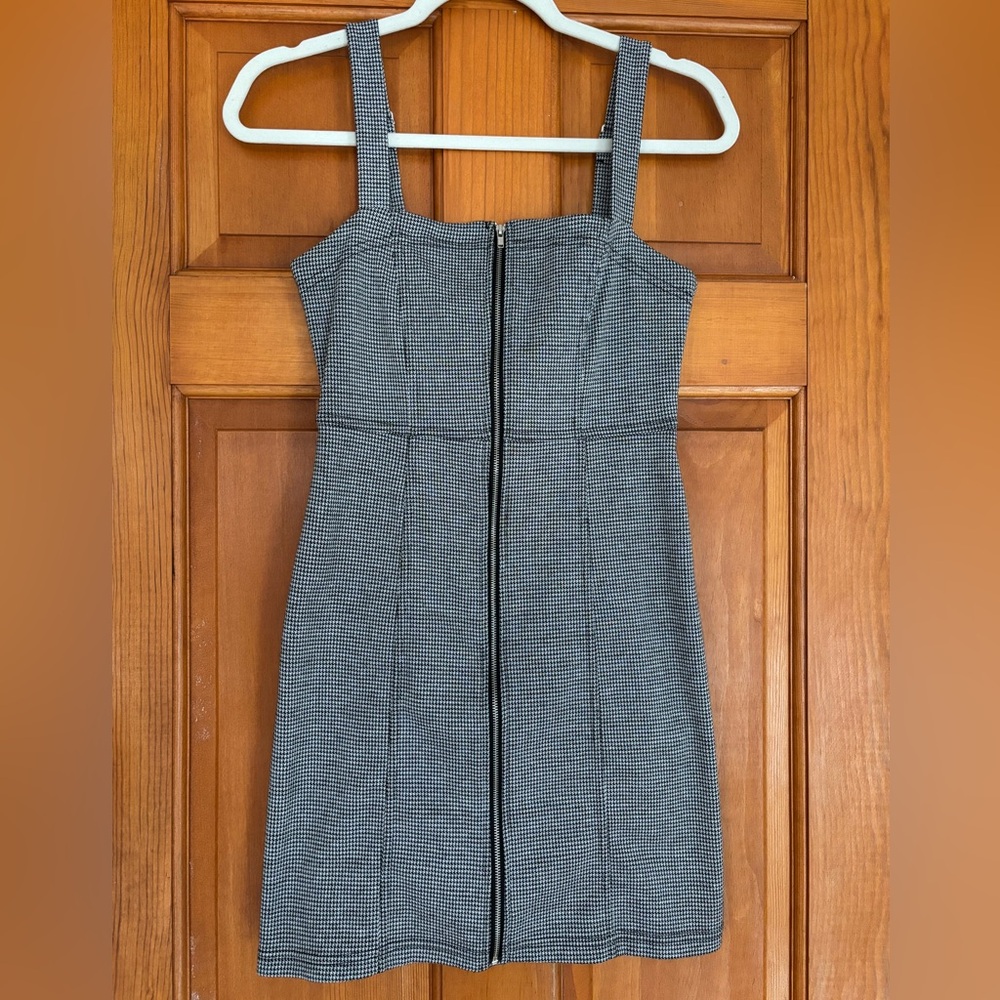 Black and white zip-front mini dress